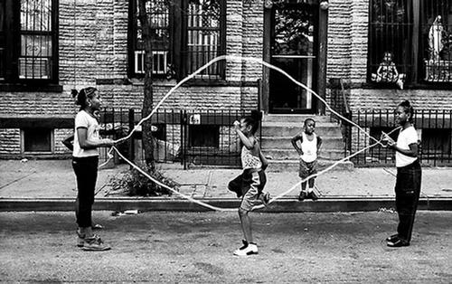 The Brooklyn of <i>Another Brooklyn</i> also calls back to another era—one filled with jump rope, jacks, chasing ice cream trucks, and dancing in fire hydrants.